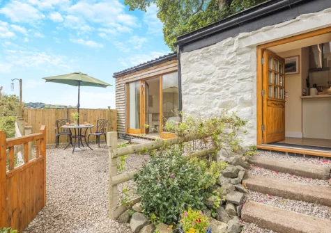 The enclosed patio & alfresco dining area at Beudy Bach, Llanrwst