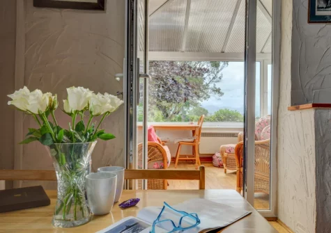 The dining area & sunroom at Blochdy, Brynsiencyn