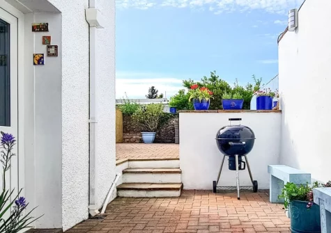 The courtyard garden & barbecue area at Bluebell House, Tenby
