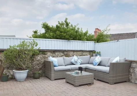 The courtyard garden& outdoor sitting area at Bluebell House, Tenby