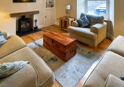 Bluebell House, Tenby is a charming three-bedroom home in this historic harbour town, featuring an enclosed courtyard garden, cosy woodburner, and flexible accommodation perfect for families exploring Pembrokeshire's golden beaches and coastal paths.