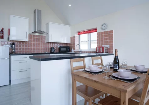 The kitchen & dining area at Bluebird, Pendine