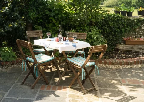 The enclosed private patio, barbecue & alfresco dining area at Bridge Cottage, Cresselly