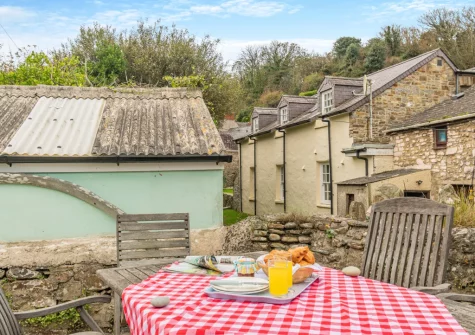 The patio & alfresco dining area, boasting incredible sea views, at Bridge House, Little Haven