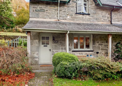 The front terrace, outdoor sitting area & garden at Brig-Y-Bwlch, Maentwrog