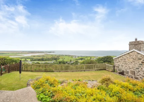 The enclosed lawned garden at Bron Y Gadair, Llanfair