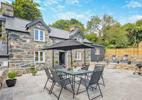 The patio, barbecue & alfresco dining area at Bryn Bras, Brithdir