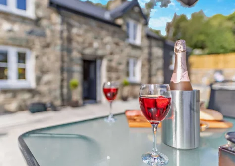 The patio, barbecue & alfresco dining area at Bryn Bras, Brithdir