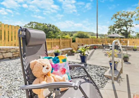 The patio & outdoor sitting area at Bryn Bras, Brithdir