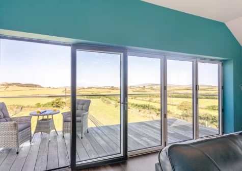 From the living room, step out on to the balcony & outdoor sitting area