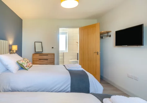 Bedroom #4 & en-suite shower room at Bryn Deufor, Anelog