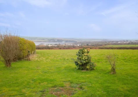 The back garden has stunning views over the Nevern Estuary and Newport Beach