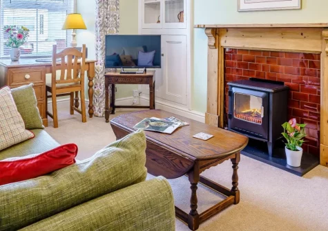 Bryncoed, Narberth is a creatively decorated three-bedroom cottage in the heart of this charming market town, featuring beamed ceilings, a cosy wood burner effect fire, enclosed garden, and easy access to Pembrokeshire's stunning coast.