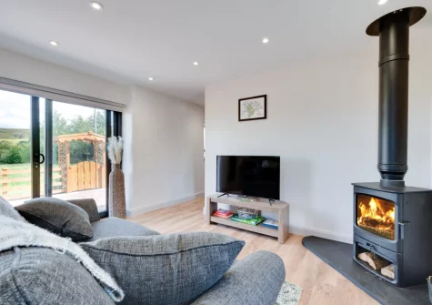The living area at Bryniau Pair Ucha Cottage, Pandy Tudur