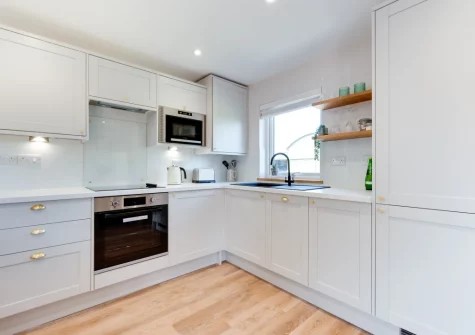 The kitchen at Bryniau Pair Ucha Cottage, Pandy Tudur