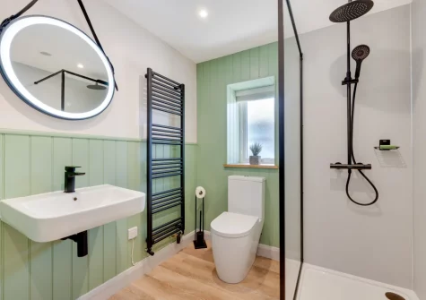 The shower room at Bryniau Pair Ucha Cottage, Pandy Tudur