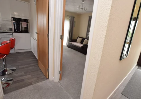 The living room & kitchen at Buttercup Cottage, Kilgetty