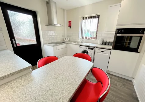 The kitchen & dining area at Buttercup Cottage, Kilgetty