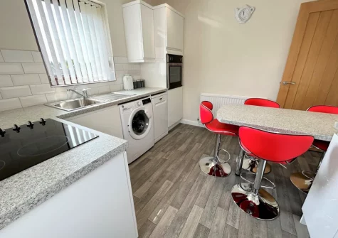 The kitchen & dining area at Buttercup Cottage, Kilgetty
