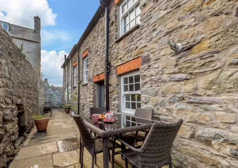 The rear courtyard & alfresco dining area at Bwthyn Clyd, St Davids