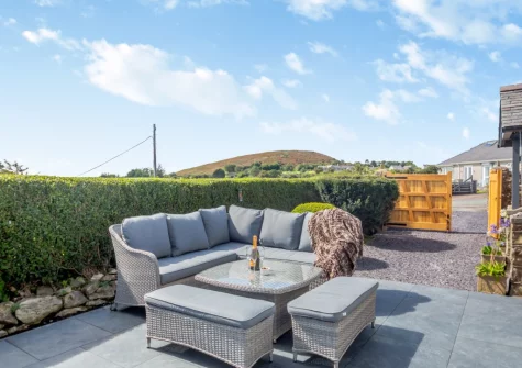 The patio & outdoor sitting area at Bwthyn Craig Wen, Mynytho
