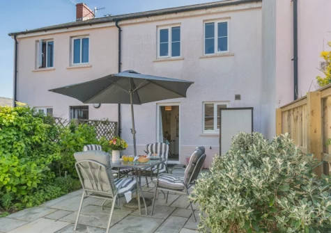 The fully enclosed patio garden & alfresco dining area at Bwthyn Y Mor, Broad Haven