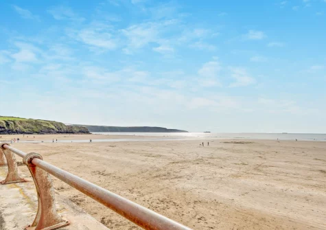 Broad Haven Beach is a popular, accessible Blue Flag sandy beach with excellent surfing & water sports opportunities