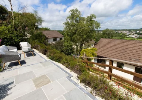 The terraced garden with upper patio & outdoor sitting area at Carmarthen Bay View, Saundersfoot