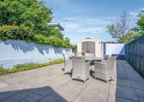 The patio & alfresco dining area at Castle Cottage, Tenby