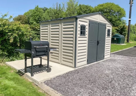 The barbecue area & lockable garden shed, for storing bikes &outdoor equipment,store at Cefn Gelli, Llawhaden