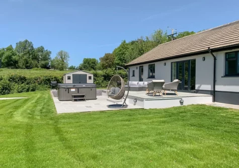 The patio, outdoor sitting area, hot tub & garden at Cefn Gelli, Llawhaden