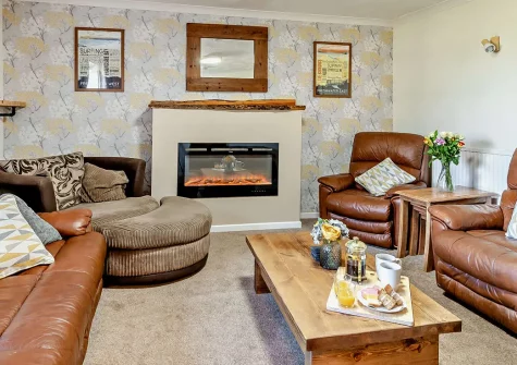 Chestnut Cottage, Stackpole is a charming 3-bedroom village retreat with a Rayburn kitchen and vintage record player. Enjoy a large garden, dog-friendly surroundings, and easy walks to stunning Barafundle Bay, perfect for coastal escapes.