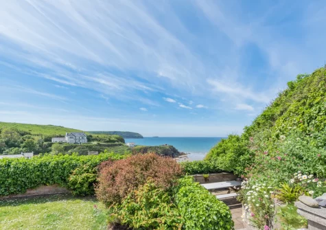 The secluded garden, patio, barbecue & alfresco dining area at Cliff Cottage, Little Haven