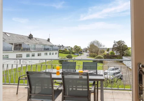 The south facing balcony & alfresco dining area at Cludfan, Abersoch