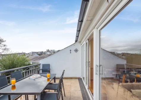 The south facing balcony & alfresco dining area at Cludfan, Abersoch