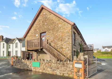 Coach House is a contemporary ground-floor coastal apartment less than 100 metres from the beach