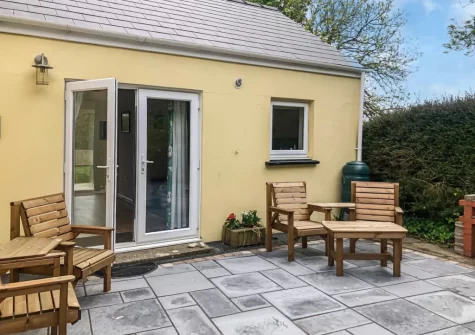 The patio & outdoor sitting area at Cowslip Cottage, Keeston