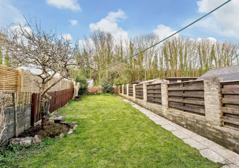 The patio & spacious enclosed garden at Cresborough, Tenby