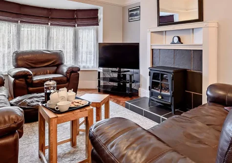 Cresborough, Tenby is a spacious mid-terrace cottage sleeping six guests and one dog. Featuring two gardens, a cosy lounge with woodburner, and proximity to a gorgeous beach and Caldey Island, it's perfect for memorable seaside family holidays.