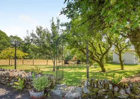 The enclosed lawned garden at Cuddfan Idris, Llanelltyd