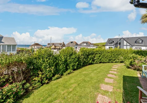 The wraparound garden & outdoor sitting area at Curlew House, Broad Haven