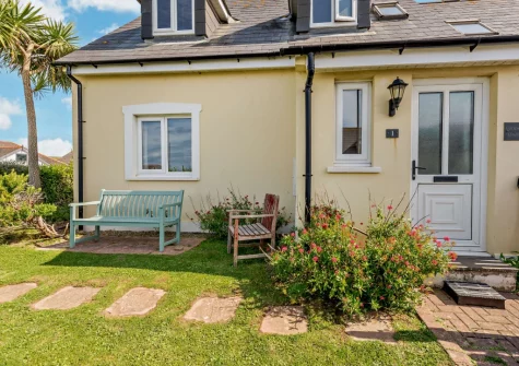 The wraparound garden & outoor sitting area at Curlew House, Broad Haven