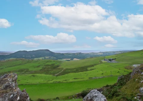 Enjoy far-reaching panoramic views acoss open farmland from the garden