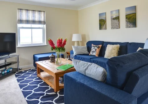 Driftwood, Amroth is a spacious 5-bedroom beachfront house with stunning sea views from the lounge and bedrooms. Perfect for families and groups seeking coastal Pembrokeshire adventures, al fresco dining, and truly unforgettable memories.