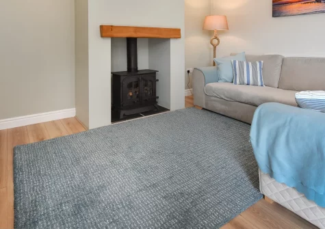 Egryn Bach, Abersoch is a beautifully finished three-bedroom home just 500 metres from the village's sandy beach, featuring sea views from the main bedroom, an enclosed patio with barbecue, and the stunning Llŷn Peninsula on your doorstep.