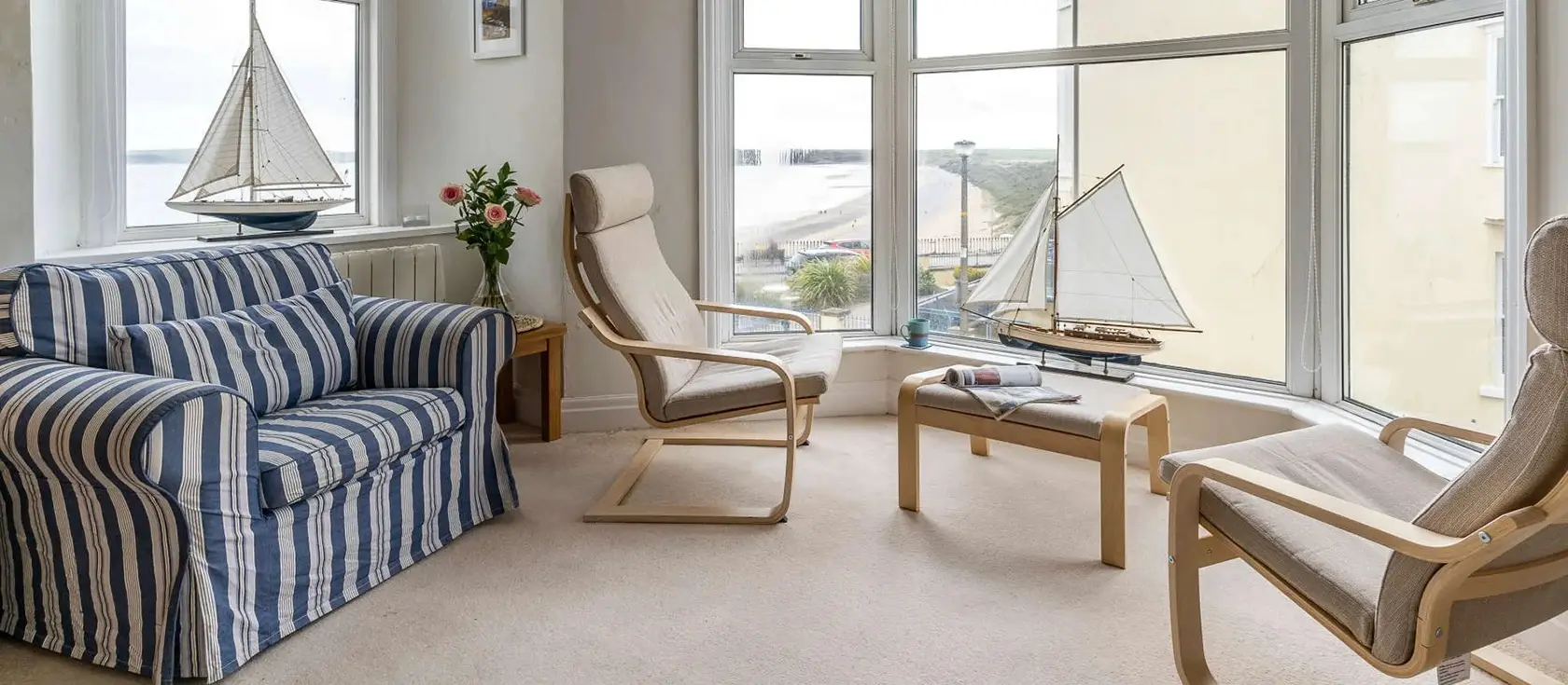 Flat 3, Beaufort House, Tenby is a charming south-facing apartment in town centre, overlooking South Beach with views of Caldey Island. Perfect for seaside holidays, dog-friendly, and within walking distance of beach, shops, and attractions.