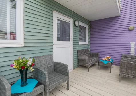 The decked terrace & outdoor sitting area at Freshwater Sea View, Freshwater East