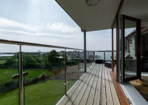 The decked balcony & outdoor sitting area at Ger y Bont, Valley