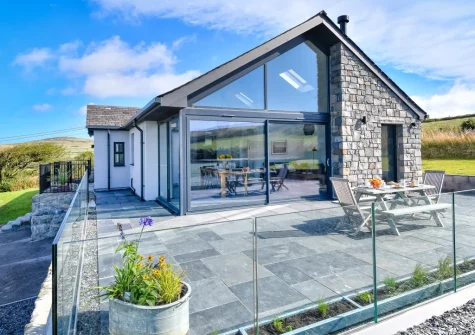 The patio, barbecue & alfresco dining area at Geufron House, Aberdaron