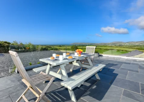 The patio, barbecue & alfresco dining area at Geufron House, Aberdaron